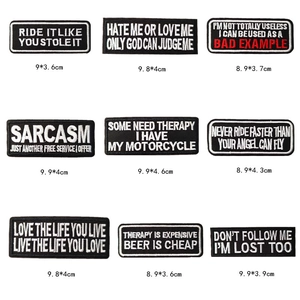 Set of 9 embroidered iron-on letter patches for jackets with dimensions displayed