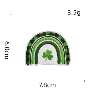 Detail showing St. Patrick's Day green clover rainbow embroidery patch for clothing