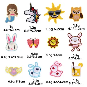 Size chart for 12 cartoon embroidered iron-on patches including mermaid and unicorn