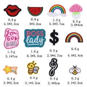 Variety set of colorful embroidered patches featuring fruit, rainbow, and star designs