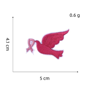 Detail view of pink pigeon and ribbon embroidery patch with exact dimensions
