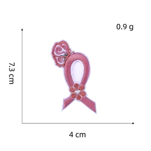 Detail shot of a pink ribbon butterfly floral embroidery patch measuring 7.3cm by 4cm