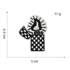 Macro shot of a black and white checkered lighter embroidery patch showing 6.5cm height
