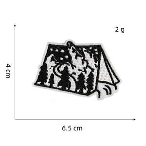 Detail showing wolf and forest mountain embroidery patch with 4cm by 6.5cm dimensions