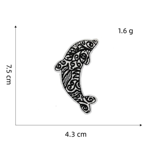 Detail showing dolphin embroidery patch dimensions 7.5cm by 4.3cm with tribal patterns