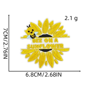 Close-up of bee and sunflower embroidered patch with size dimensions and 2.1g weight