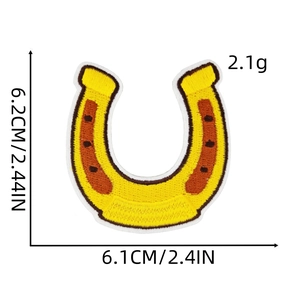 Macro detail of horseshoe embroidery patch with precise size dimensions and yellow stitching