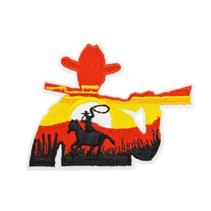 Western cowboy style embroidery patch featuring a sunset and rider on white background