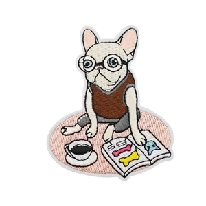 French bulldog embroidery patch featuring a dog reading books with coffee elements