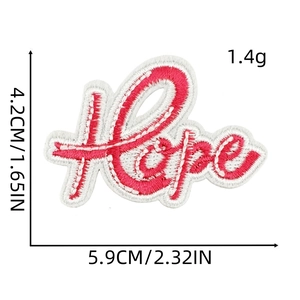 Detail view showing Hope embroidery patch with dimensions 4.2cm by 5.9cm in pink and white