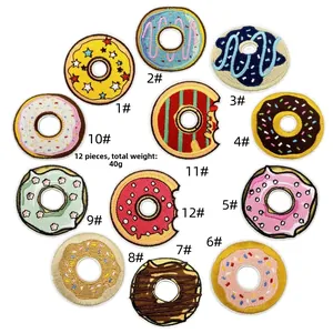 Detailed set of 12 colorful doughnut embroidery patches with various icing designs