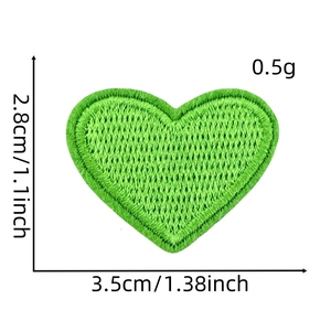 Detailed view of green heart embroidery patch with size dimensions 3.5cm by 2.8cm