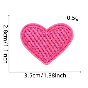 Detailed close-up of a pink heart embroidered patch with precise dimension measurements