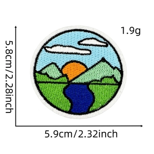 Detail of round outdoor mountain landscape embroidery patch with sunset and river