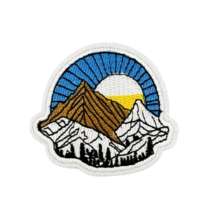 Outdoor mountain adventure embroidered patch with sunset and forest for clothing
