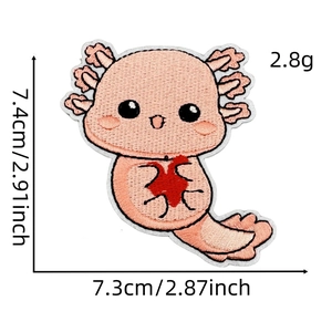 Close-up of pink axolotl cartoon embroidery patch with red heart and dimension markings