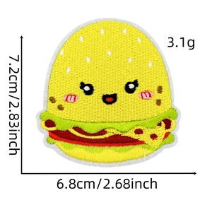 Close-up of a cartoon burger embroidery patch with size labels and cute facial expression