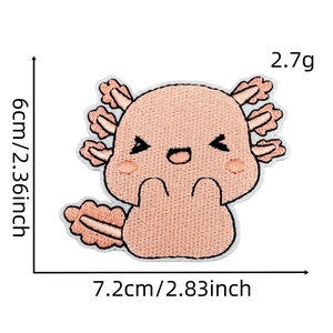 Macro detail of cartoon pink axolotl dinosaur embroidery patch showing 7.2cm x 6cm size