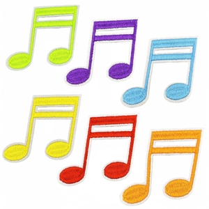 Detail of colorful musical note embroidery patches with fine stitching and white borders