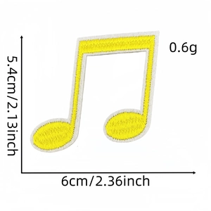 Detail view of yellow musical note embroidery patch with dimensions and precise stitching