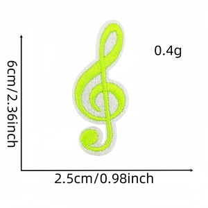 Detailed size view of yellow treble clef musical note embroidered patch for clothing