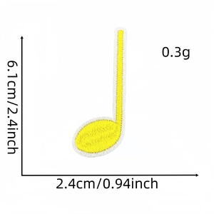 Detailed dimensions of yellow music note embroidery patch measuring 6.1cm by 2.4cm