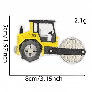 Detail of yellow road roller embroidery patch with 8cm x 5cm dimensions and fine texture