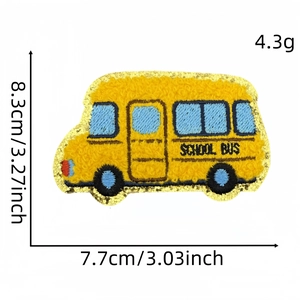Detail of yellow school bus chenille patch with gold sequins and embroidery texture