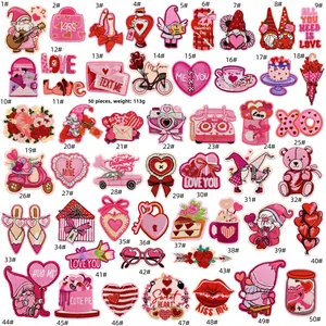Detailed grid view of 50 red and pink Valentine's Day embroidered iron-on patches