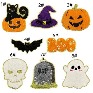 Detailed close-up of chenille Halloween patches featuring black cat, pumpkin, and ghost designs