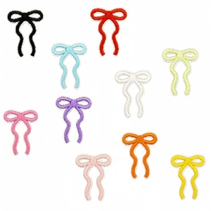 Set of 10 colorful mini embroidered bow patches with heat-seal backing for DIY apparel