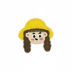 Detailed cartoon girl embroidery patch with yellow hat and braids for clothing decor