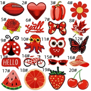 Detailed grid of 20 assorted red embroidery iron-on patches with fruit and floral patterns
