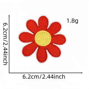 Red flower embroidered patch with yellow center and white border measures 6.2cm