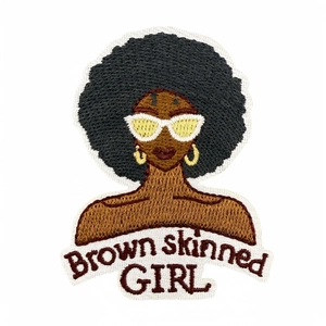 Embroidered patch of a black girl with Afro and sunglasses, Brown skinned GIRL text