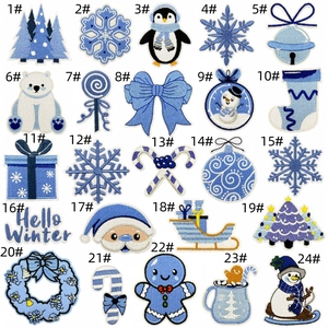 Detailed collection of 24 blue and white winter themed embroidered iron-on patches