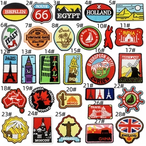 Detail view of 28 assorted world landmark embroidery patches for clothing and bags