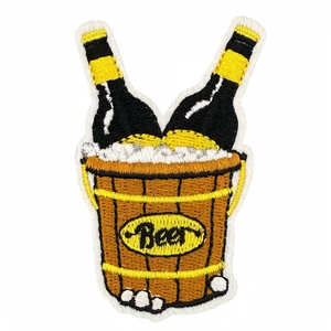 Cartoon beer bucket embroidery patch with detailed stitching on a white background