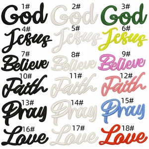 Macro view of 18 colorful religious word embroidery patches with fine stitching detail