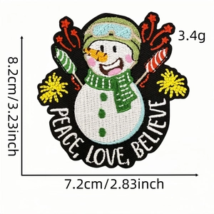 Detail view of snowman embroidery patch with Peace Love Believe text and size markings