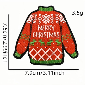 Macro detail of Christmas ugly sweater embroidery patch with Merry Christmas text