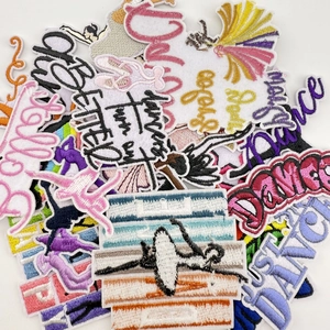 Detailed view of ballet dance series embroidered patches with vibrant colorful threads