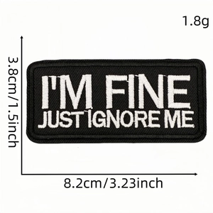 Embroidered black rectangular patch I'M FINE JUST IGNORE ME with dimensions 8.2x3.8cm