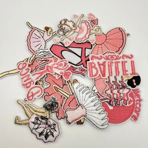 Close-up of pink ballet girl embroidery patches with dance lettering and ribbon detail