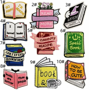 Detailed macro view showing 10 assorted book-themed embroidered iron-on patches