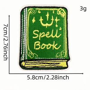 Embroidered green spell book patch with yellow spell book lettering 7x5.8cm