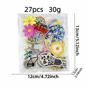 Set of 27 colorful daisy flower embroidery patches with sun and bike designs