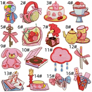 Detailed grid view of 16 vintage pink cartoon embroidered patches for clothing decor