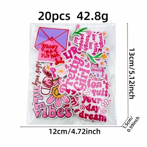 Set of 20 pink and purple embroidered patches with inspirational quotes and floral designs