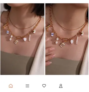 Detaillierte Nahaufnahme der doppellagigen Goldkette mit Barockperlen und Kamera-Anhängern